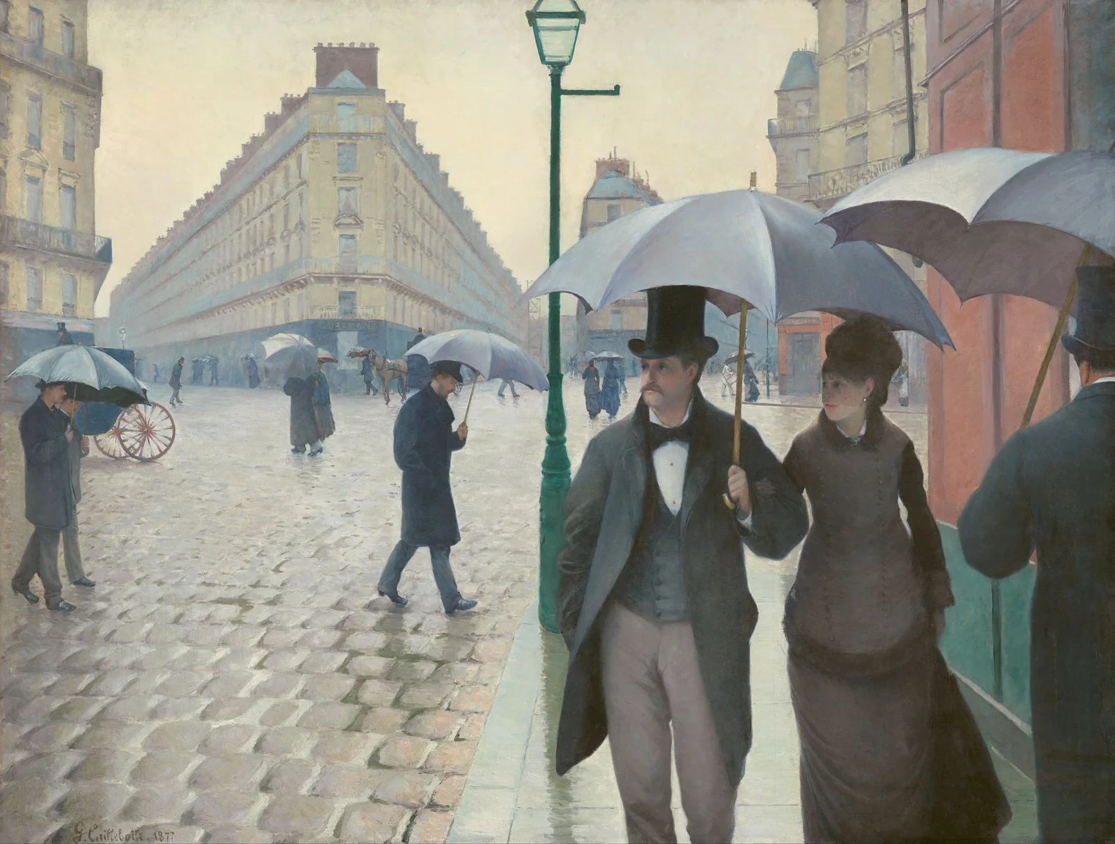 Caillebotte’s Paris Street; Rainy Day: a couple under one umbrella walk toward us across wet cobblestones at a Paris crossroads, other walkers and a green lamppost behind.