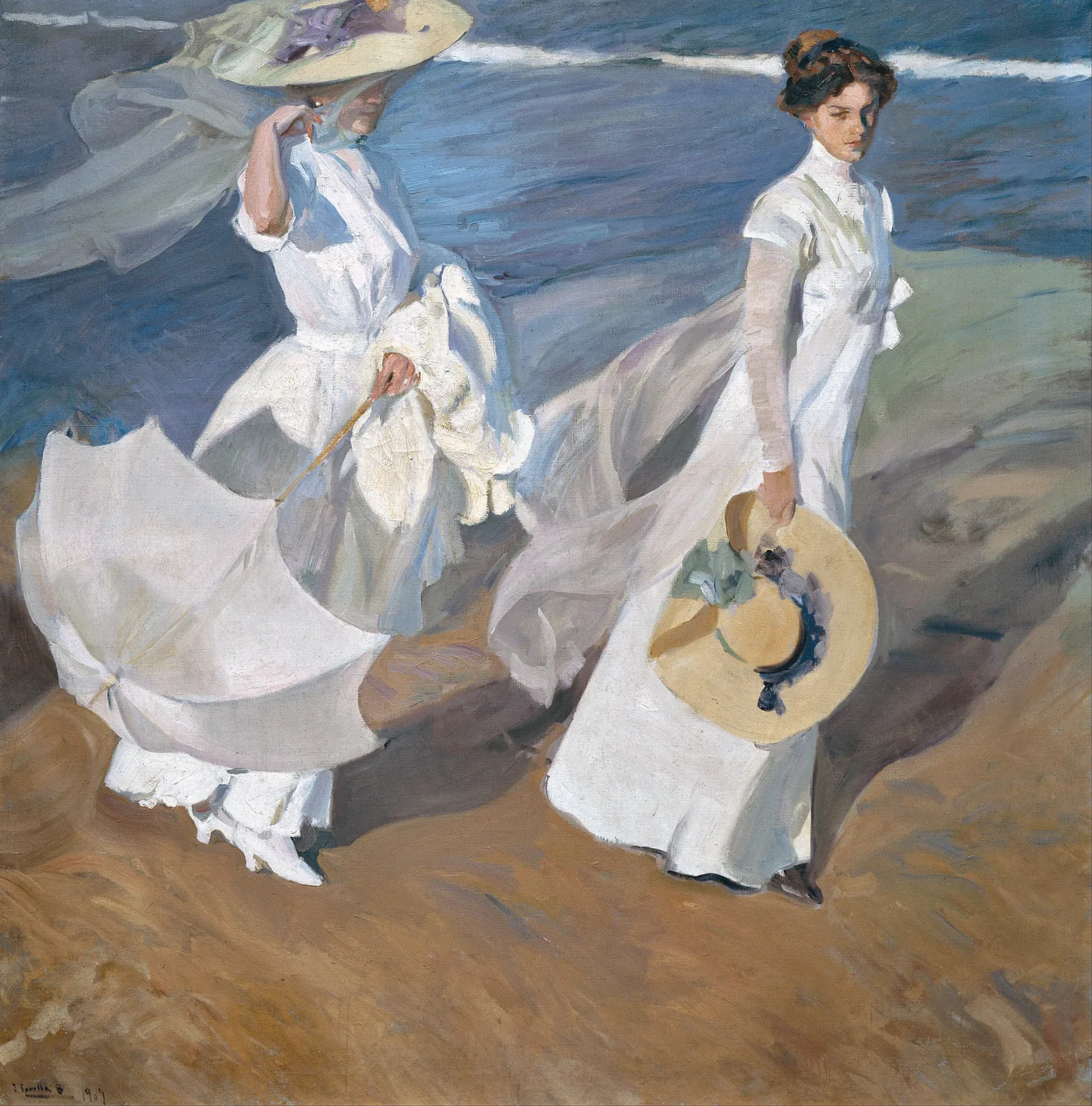 Sorolla’s Strolling along the Seashore: two women in white summer dresses and veils walk along a bright beach, wind lifting the fabric against a blue sea.